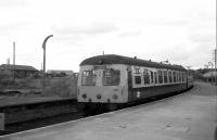 DMU set 300 westbound in Forres Station, at 1745 on the 31st of March 1979. The DMU is a BR Class 120, Swindon built in 1959.<br><br>[Peter Todd 31/03/1979]