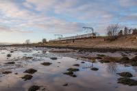 A Helensburgh - Edinburgh service leaves Cardross.<br><br>[Ewan Crawford 27/11/2016]