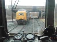 The view from a New Year's Day 2011 DMU service from Rawtenstall to Heywood. <I>Deltic</I> 55022 <I>Royal Scots Grey</I> and a couple of diesel shunters are on the stabling road outside the small diesel repair shed at Castlecroft Goods. <br><br>[Mark Bartlett 01/01/2011]