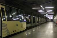 The <I>Centovalli</I> (Hundred Valleys) line runs for 52 scenic kilometres between Domodossola in Italy and Locarno in Switzerland. Despite the intervening scenery [See image 56077] the two terminals are underground. This is Locarno, beneath the SBB station, and when opened in 1990 the underground tracks replaced a street running section through the city. One of the new <I>Panorama</I> EMUs sits in the main platform while earlier units are stabled beyond.   <br><br>[Mark Bartlett 24/06/2016]