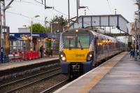 A 334 for Milngavie draws to a stop at Anniesland.<br><br>[Ewan Crawford 09/12/2016]