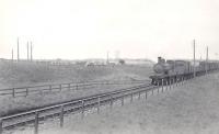 A Fraserburgh - Aberdeen goods passing Kirkton on 7 July 1951 hauled by ex-GNSR D40 4-4-0 62261.<br><br>[G H Robin collection by courtesy of the Mitchell Library, Glasgow 07/07/1951]