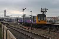 Northern Pacer 142044 heads a Huddersfield (via Manchester) service out of Platform 2 at Blackpool North on 7th December 2016. The semaphores here are controlled from Blackpool No.2 box, scheduled to be closed in November 2016 but given a <I>stay of execution</I> until November 2017 with electric trains due to start running in 2018.  <br><br>[Mark Bartlett 07/12/2016]