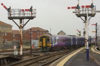 158757 sets off on a trans-pennine journey from Blackpool North to York on 29 October 2016. The semaphore signals will start to disappear during 2017 as Blackpool North is significantly modified as part of the electrification from Preston.<br><br>[John McIntyre 29/10/2016]