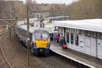 334s passing at the south end of Hyndland station.<br><br>[Ewan Crawford 09/12/2016]