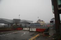 An updated photo of Port Talbot Parkway station with the level crossing now closed to all traffic and fenced off completely. The train is the 1348 from PT to Paddington.<br><br>[Alastair McLellan 08/12/2016]