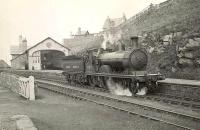 Scene at Banff station on 14 July 1950, with ex-GNSR 4-4-0 62251 alongside the platform.<br><br>[G H Robin collection by courtesy of the Mitchell Library, Glasgow 14/07/1950]