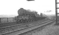 An unidentified Gresley A3 Pacific brings a southbound ECML train off the south end of the King Edward Bridge shortly after leaving Newcastle Central in the early 1960s.<br><br>[K A Gray //]