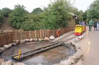 Trains on the South Lakeland Zoo miniature railway at Dalton perform an <I>out and back</I> loop past the animal enclosures and then the locomotive is turned on the neat turntable. Resident diesel 2011 has just arrived in the station on 22nd August 2016 and will shortly run round the train. In 2017 the zoo was reported to be likely to close due to concerns about animal welfare.  <br><br>[Mark Bartlett 22/08/2016]