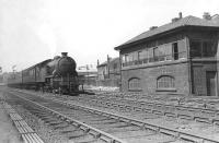 A Hyndland - Easterhouse train passing Camlachie box on 1 May 1958 behind V1 2-6-2T 67633.  <br><br>[G H Robin collection by courtesy of the Mitchell Library, Glasgow 01/05/1958]