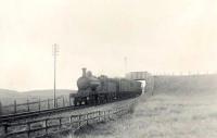 Ex-GNSR D40 4-4-0 62279 <I>Glen Grant</I> passing Kirkton in 1951 with an Aberdeen - Fraserburgh train. <br><br>[G H Robin collection by courtesy of the Mitchell Library, Glasgow 06/07/1951]