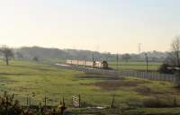 The overnight frost has gone from the fields as 37403 <I>Isle of Mull</I> approaches Woodacre with the 2C47 Preston to Barrow-in-Furness service on 29th December 2016. <br><br>[Mark Bartlett 29/12/2016]