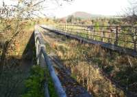 Last crossed by the Greenlaw - St Boswells goods in 1965 [see image 40067], Leaderfoot Viaduct is seen here looking north across the River Tweed in December 2016. Photograph taken through a gap in the safety fence. <br><br>[John Furnevel 27/12/2016]