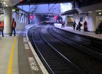 Sunshine brings great contrasts at New Street [see image 51152], but this is 15.32 on a winter afternoon. The Crowd Control stewards on the left didn't seem to be overwhelmed.<br><br>[Ken Strachan 27/12/2016]