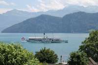 Lake Lucerne PS <I>Uri</I> leaves the landing stage in Weggis to head west towards Lucerne in June 2016. This is one of five operational steam powered paddlers on the lake, and the oldest having been launched in 1901. The others are the <I>Unterwalden, Schiller, Gallia </I>and<I> Stadt Luzern</I>. A sixth, the <I>Wilhelm Tell,</I> survives as a floating restaurant in Lucerne Harbour. <br><br>[Mark Bartlett 28/06/2016]