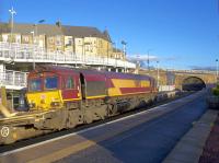 66103 on a rail train shoots through Shotts on a sunny 4th January 2017. The fine masonry bridge in the distance will be demolished in the next few days as part of the preparation for electrification.<br><br>[Colin McDonald 04/01/2017]