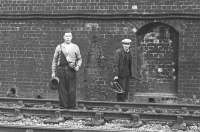 Line maintenance team near Ladhope Tunnel, Galashiels, in the 1950s/60s. (John O'Neil and unidentified colleague). Gary Straiton adds: The chap on the right is Mick Guthrie. Mr. O'Neil was a hard man. He was of Irish descent and was always fighting. He had a habit of asking lads for their big jackets to take back to Ireland. Had to beg for his job after being caught fighting in a wagon in Gala yard ...<br><br>[Dougie Squance (Courtesy Bruce McCartney) //]