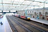 Wide view looking south from the footbridge at Carlisle station in the summer of 2002 as 90013 <I>The Law Society</I> arrives at platform 3 with a Virgin WCML service.<br><br>[John Furnevel 03/07/2002]