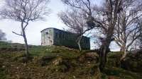 This is an old coach on the Speyside Way near Ardbeg Farm, North of  Cromdale, this is a mile or so from the Speyside railway line.<br><br>[Alan Cormack 06/04/2015]