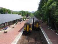 Mid-morning trains cross at Spean Bridge on 3rd June 2016.<br><br>[David Spaven 03/06/2016]