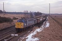 Located between Markinch and Ladybank, Lochmuir had a Down loop and signal box until July 1980.  40030 eases a Northbound working out of the loop on 6th February 1979.<br><br>[Graeme Blair 06/02/1979]