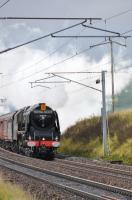 6233 Duchess of Sutherland approaching Wandel, hauling West Coast Railways Royal Scot from Stafford to Stirling on 2nd October 2010.  6233 hauled the train from Carlisle to Stirling, then back to Carnforth.  Scheduled to depart Abington at 10:25 and pass Carstairs at 10:42, she was probably 30 minutes late already.<br><br>[Norman Glen 02/10/2010]