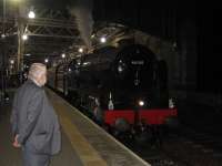 ScotRail's John Yellowlees admires Royal Scot at Edinburgh Waverley on its return from Tweedbank on 11th September 2016.<br><br>[David Spaven 11/09/2016]