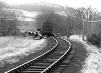 A class 08 running light engine along the Selkirk branch, thought to be in the early 1960s, crosses the River Tweed at Ettrickfoot [see image 57798].<br><br>[Dougie Squance (Courtesy Bruce McCartney) //]