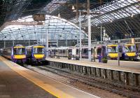 A typical mid-afternoon scene at Queen Street in January 2017, with four 3-car class 170 DMUs under the near complete EGIP wiring.<br><br>[Colin McDonald 25/01/2017]