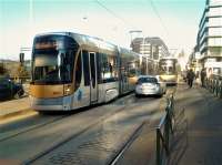 Busy lunchtime at Botanique, an interchange between tram and underground systems in Brussels. The smart looking 3001, in silver and gold livery, was the first tram into the station for quite a while as there had been a police incident blocking the tracks. Several more trams were queuing behind it and the car on the line belonged to a Metro supervisor who had arrived to sort things out. 26th January 2017<br><br>[Mark Bartlett 26/01/2017]