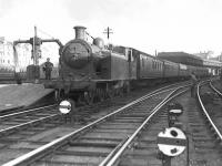 Looking back into the terminus at Bridgeton Central on 11 June 1957, where C16 4-4-2T 67482 is performing station pilot duties.<br><br>[G H Robin collection by courtesy of the Mitchell Library, Glasgow 11/06/1957]