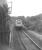 A northbound freight on the Waverley route in the late 1960s about to pass a 350hp shunting locomotive. The photograph is thought to have been taken around a mile south of Tweedbank. [Ref query 2730] <br><br>[Dougie Squance (Courtesy Bruce McCartney) //]