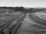 Looking north to Hirst signalbox on the NCB Ashington system.  Hirst Platform was located on the sidings to the left, terminus for passenger (mainly miners) services to Linton and Ellington Collieries.  This operation ceased in 1966. Most mining in the area shut down in 1988 along with the railway.<br><br>[Bill Roberton //1987]