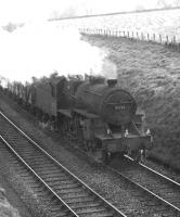 'Crab' 2-6-0 42752 off Carlisle Canal shed approaching Kelso Junction with a down freight in September 1962. [Ref query 681]<br><br>[Dougie Squance (Courtesy Bruce McCartney) /09/1962]