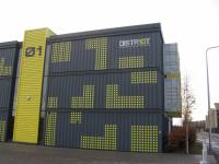 Close up of Building 1: Spot the difference from an intermodal railhead - one of the much-promoted new office buildings on the 'digital media park' adjacent to Dundee West yard is constructed of three dozen 40 foot containers. Oh the irony.<br><br>[David Spaven 29/11/2016]