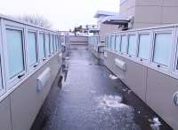 Brrr – I've shut all the windows and there's still a cold draught! <br>
The new footbridge at Hyndland station unexpectedly features what appear to be <I>al fresco</I> double glazed window panels. <br><br>[Colin McDonald 21/01/2015]