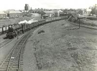 Jubilee 45724 <I>Warspite</I> approaching Ardrossan North heading for Montgomerie Pier in the summer of 1959. The train is a Women's Guild special from Newcastle. [Ref query 695]   <br><br>[G H Robin collection by courtesy of the Mitchell Library, Glasgow 06/07/1959]