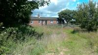 A view of the former station building from the yard entrance.<br><br>[Brian Adam 23/07/2015]