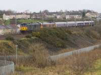 73698 leads 66733 with the Aberdeen sleeper stock on its way to Polmadie to be serviced. Engineering work has led to a Dundee start with a connecting bus for the southbound sleeper on three Sundays in February 2017.<br><br>[Colin McDonald 11/02/2017]