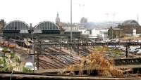 Wide view south from above Gasworks Tunnel in July 2005. Down below, the former 'Kings Cross Loco' is a wasteland, with standby locomotives now stabled in the short bays over on the left. A Regional Eurostar is preparing to leave with the <I>White Rose</I> service to Leeds. Work is well advanced on the St Pancras International project, with the new extension built to handle domestic services off picture to the right [see image 55441].<br><br>[John Furnevel /07/2005]