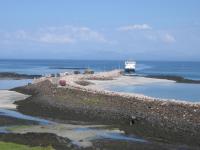 The new pier on Eigg with the CalMac ferry approaching from Mallaig.<br><br>[David Spaven //2016]