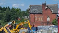 A side view of the station building at Possil, looking north. Most of the site is now a scrapyard.<br><br>[John Yellowlees 16/08/2016]