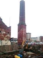 Part of the former Edinburgh Corporation Shrubhill tram depot on 20 January 2017, showing the unique octagonal brick chimney which once served the site's power station. The chimney is to be retained as an integral part of the redeveloped site.<br><br>[Andy Furnevel 20/01/2017]