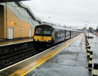 For passengers who have joined this train from Dalmuir via Whifflet it ostensibly terminates here at Motherwell, but in fact it carries on back to Dalmuir via the Hamilton circle. It's perhaps not surprising it's not announced as a through service as it would cause some confusion. Photographed 11/02/2017.<br><br>[David Panton 11/02/2017]