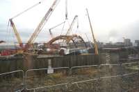 A view of the new bridge on the Ordsall Chord on 22 February 2017, taken from a passing Manchester Victoria to Liverpool Lime Street service.<br><br>[John McIntyre 22/02/2017]