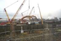 A view of the new bridge on the Ordsall Chord on 22 February 2017, taken from a passing Manchester Victoria to Liverpool Lime Street service.<br><br>[John McIntyre 22/02/2017]