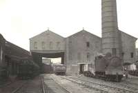 Looking north towards Windmillcroft at the Tradeston Refuse Destructor in March 1956. To the left is the Tradeston Gasworks No 3 and off to the right is the Caledonian's West Street Goods.<br><br>[G H Robin collection by courtesy of the Mitchell Library, Glasgow 29/03/1956]