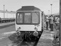 107 444 at Rosyth Dockyard with the Tay Forth Venturer on 16 June 1984.  View looking east. This was a private station in the dockyard. Unadvertised passenger trains still served the station until around 1989.<br><br>[Bill Roberton 16/06/1984]