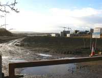 View south from Whitehill Road over the north east corner of Millerhill Yard on Sunday 26 February 2017. All was fairly quiet, although some excavation work was taking place further south beyond the fence. Over on the west side of the former yard is the Biogen food waste recycling plant, with construction work in progress on the much larger RERC facility beyond. [See image 58019]  <br><br>[John Furnevel 26/02/2017]