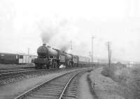 A down West Highland Line train photographed between Cowlairs West and North boxes on a grey Saturday 26 April 1952, hauled by a pair of Eastfield shed's class K2 2-6-0s. The leading locomotive is 61764 <I>Loch Arkaig</I>, with 61776 tucked in behind.   <br><br>[G H Robin collection by courtesy of the Mitchell Library, Glasgow 26/04/1952]